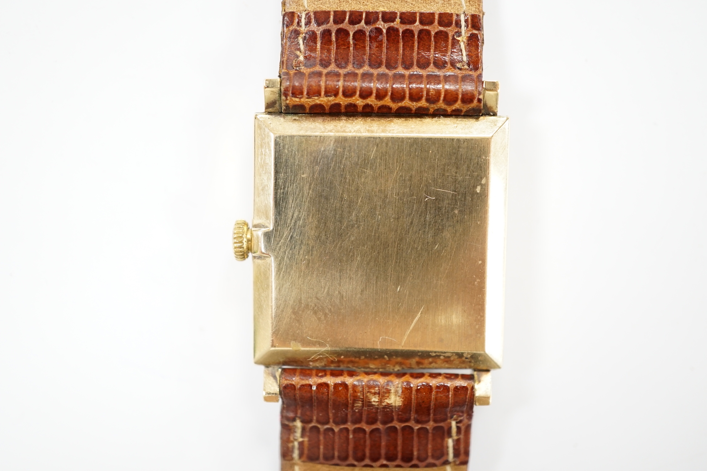 A gentleman's 9ct gold Bueche Girod manual wind square cased dress wrist watch, on a leather strap.